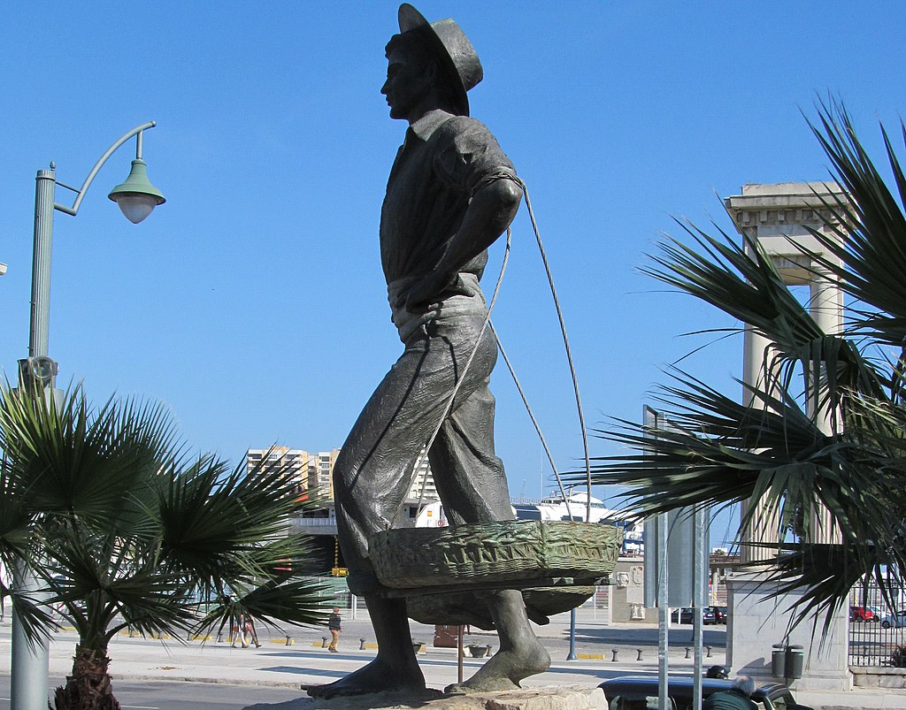 Statue of El Cenachero, one of the symbols of Málaga