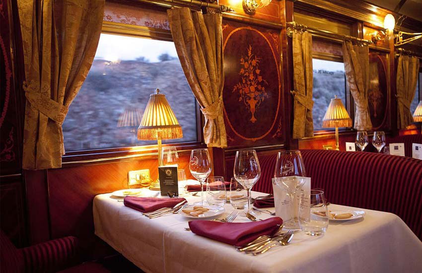 Dining table set for two on a luxury train. Tren al Andalus