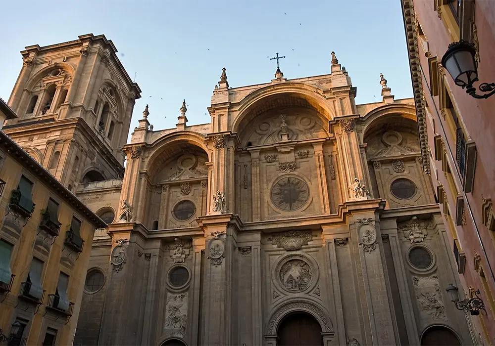 Granada Cathedral south portal. Image via Wikipedia. Author Pom2 under Creative Commons Attribution-Share Alike 3.0 Unported license.