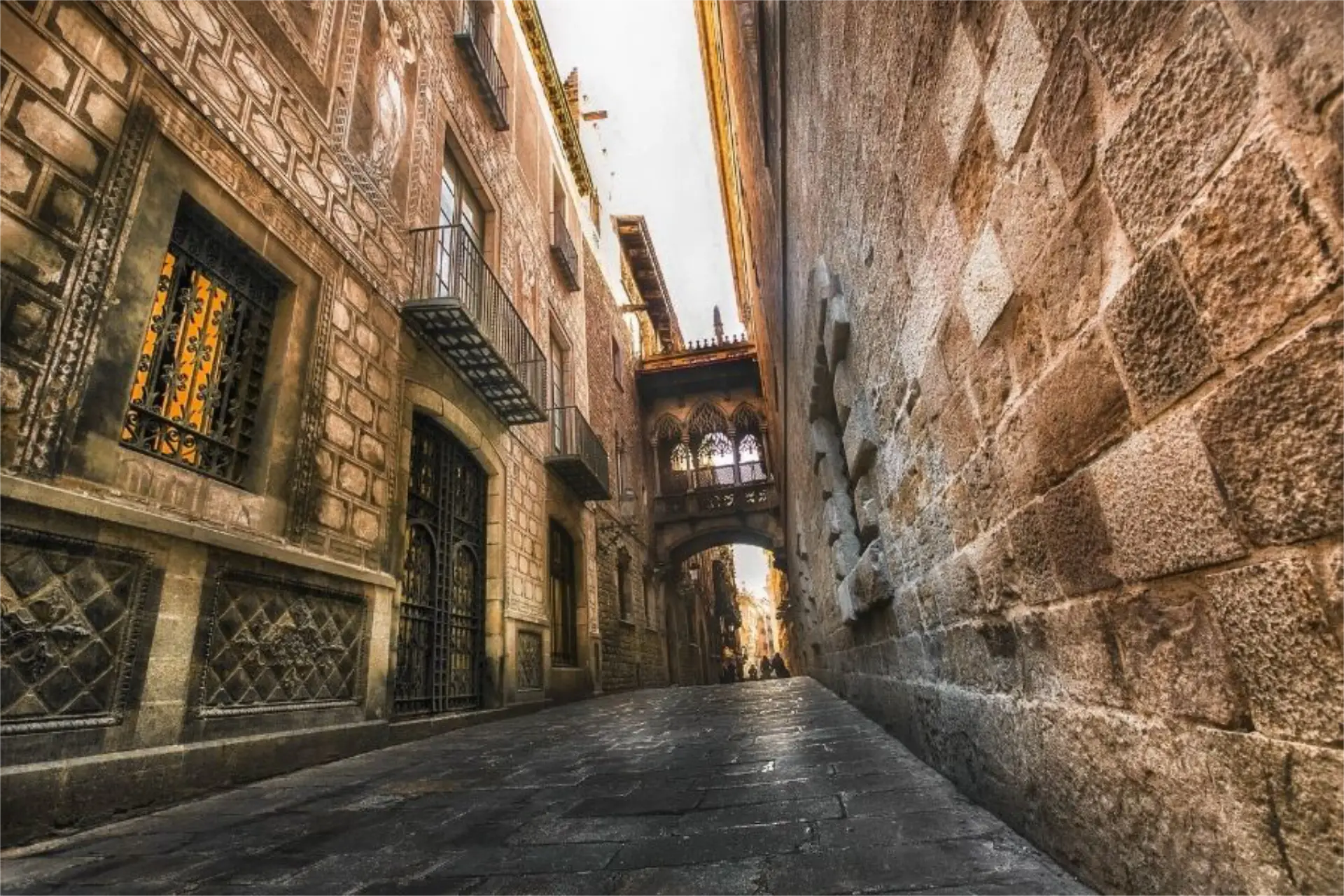 Gothic Quarter – sun though arch on stone. Created on Canva