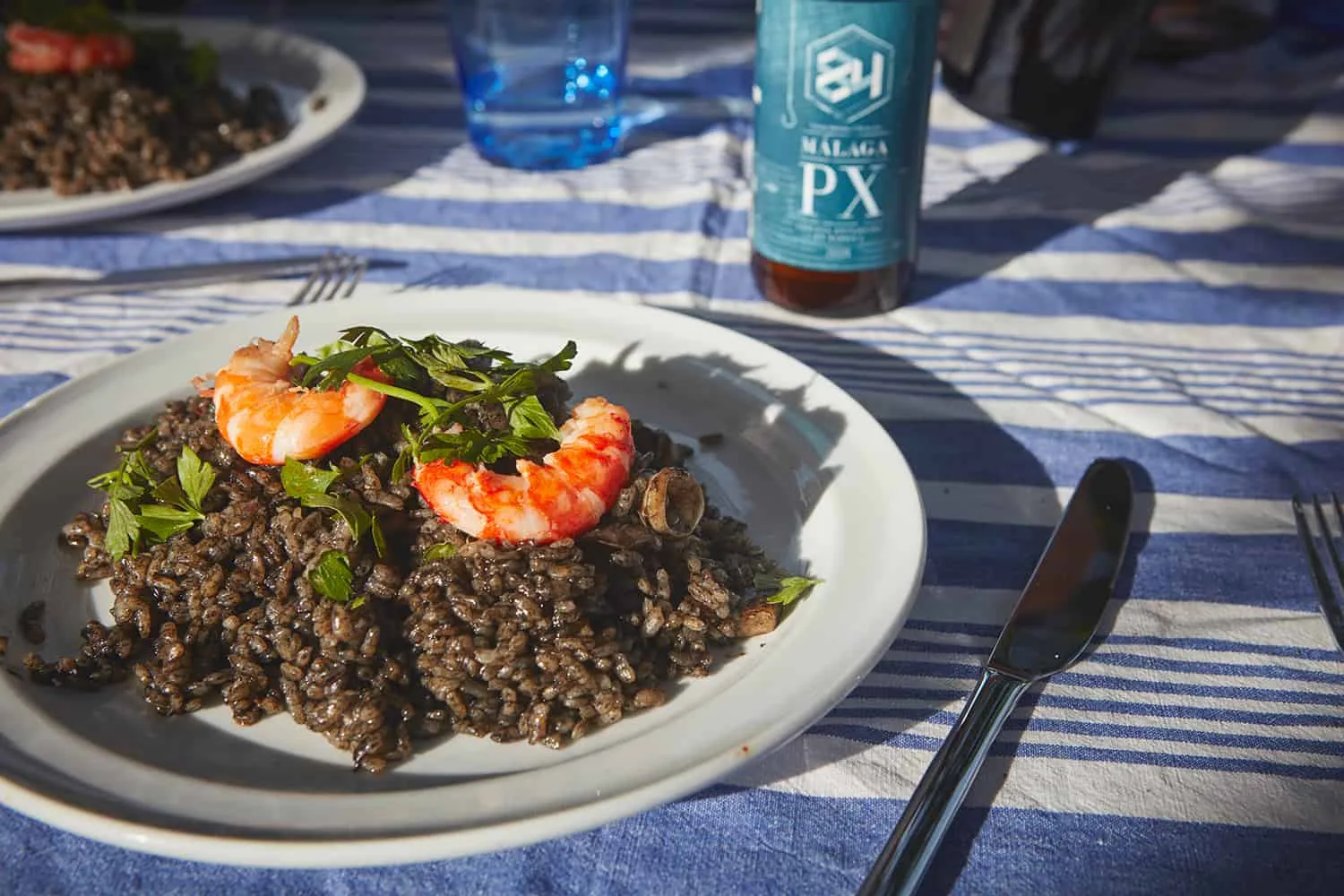 Slow Travel in Spain: Take your time 2 black rice food on table