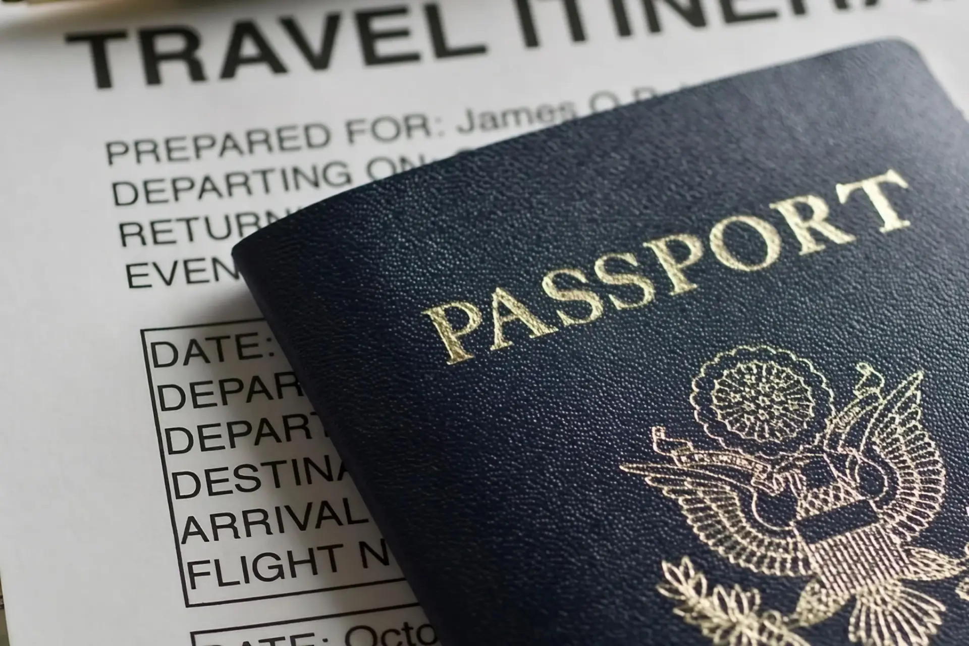 Planning a trip to Andalucia using a specialist. Image shows passport with personalised travel itinerary poking out. Image credit: KLH49 from Getty Images Signature via Pro Canva licence