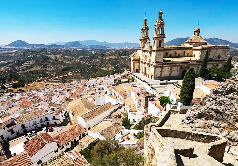 TOMA Spotlight: 8 Beautiful villages in Andalucia 1 Olvera: view of Nuestra Señora de la Encarnación church from the castle. Image courtesy of Turismo Olvera