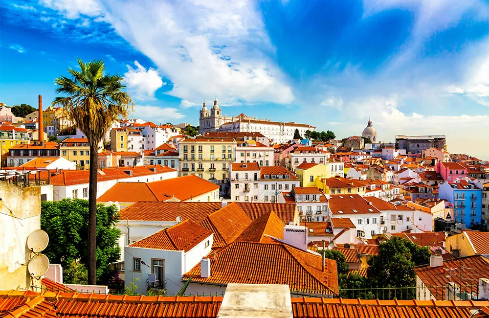 Alfama old town Photo by Michał Ludwiczak: https://www.pexels.com/photo/alfama-old-town-district-viewed-from-miradouro-das-portas-do-sol-observation-point-in-lisbon-portugal-12956566/