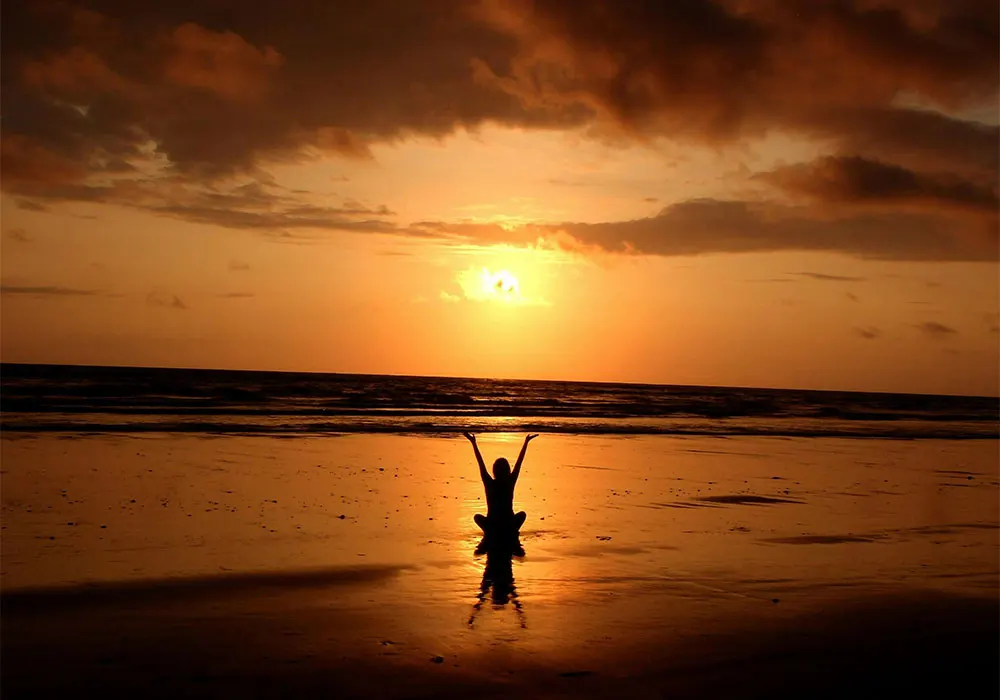 Rejuvenate on Holiday: Make Time to Yourself 3 Camino pilgrim in sunset – Image: iStock