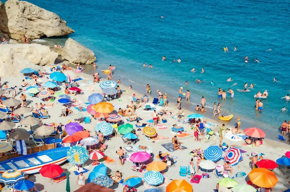What Spain’s tourism surge means for travellers in 2025 2 congested beach in Nerja. Image credit: Istock
